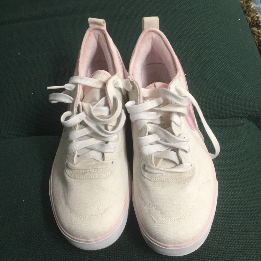 White and pink canvas Nike sneakers